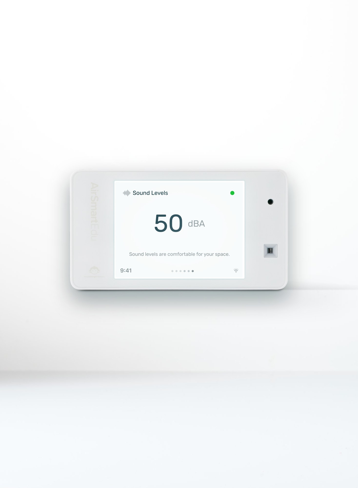 AirSmart EcoConnect on a light background, its screen showing the sound level.